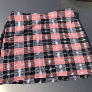 black , white, and blush pink shirt